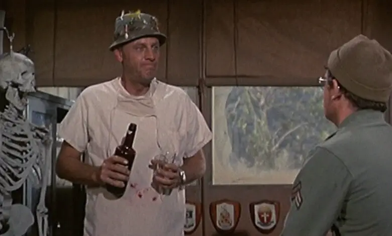 Photo of McLean Stevenson stopped and dressed an open wound after a car accident